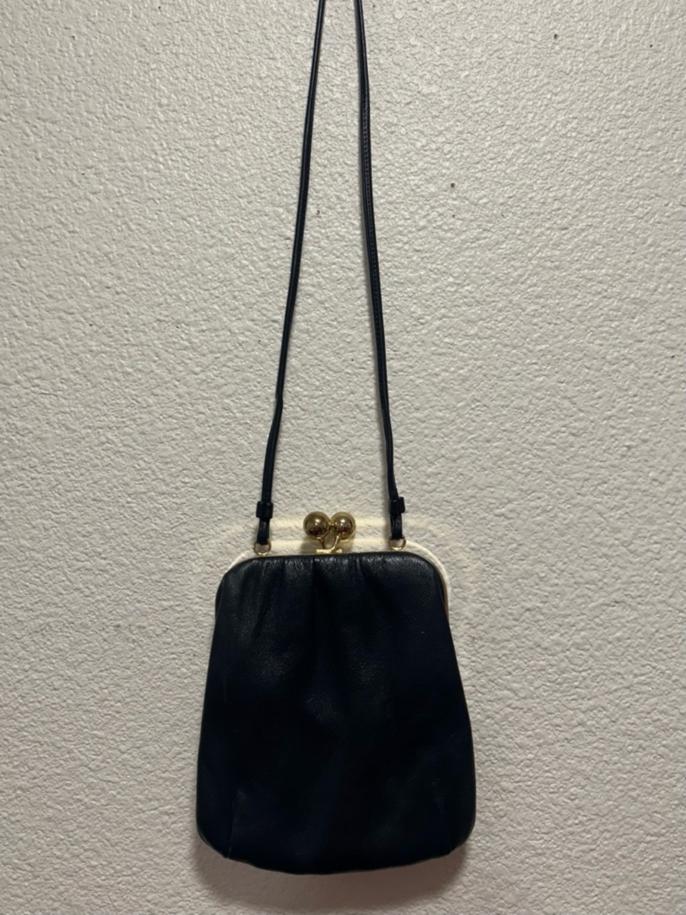 Black Leather Crossbody Bag with Gold Kiss-Lock Closure